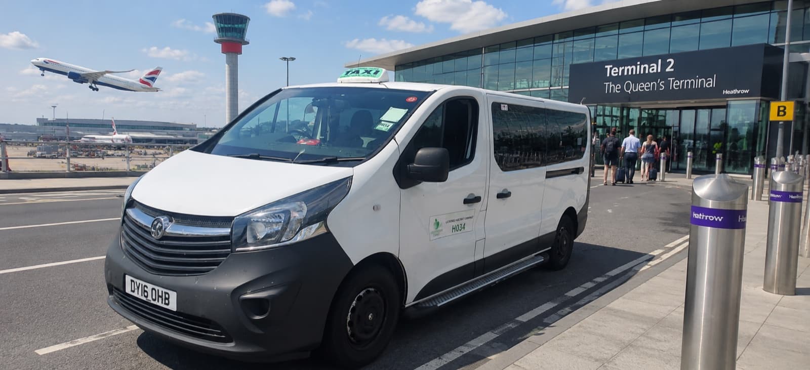 Minibus outside Heathrow Terminal 2